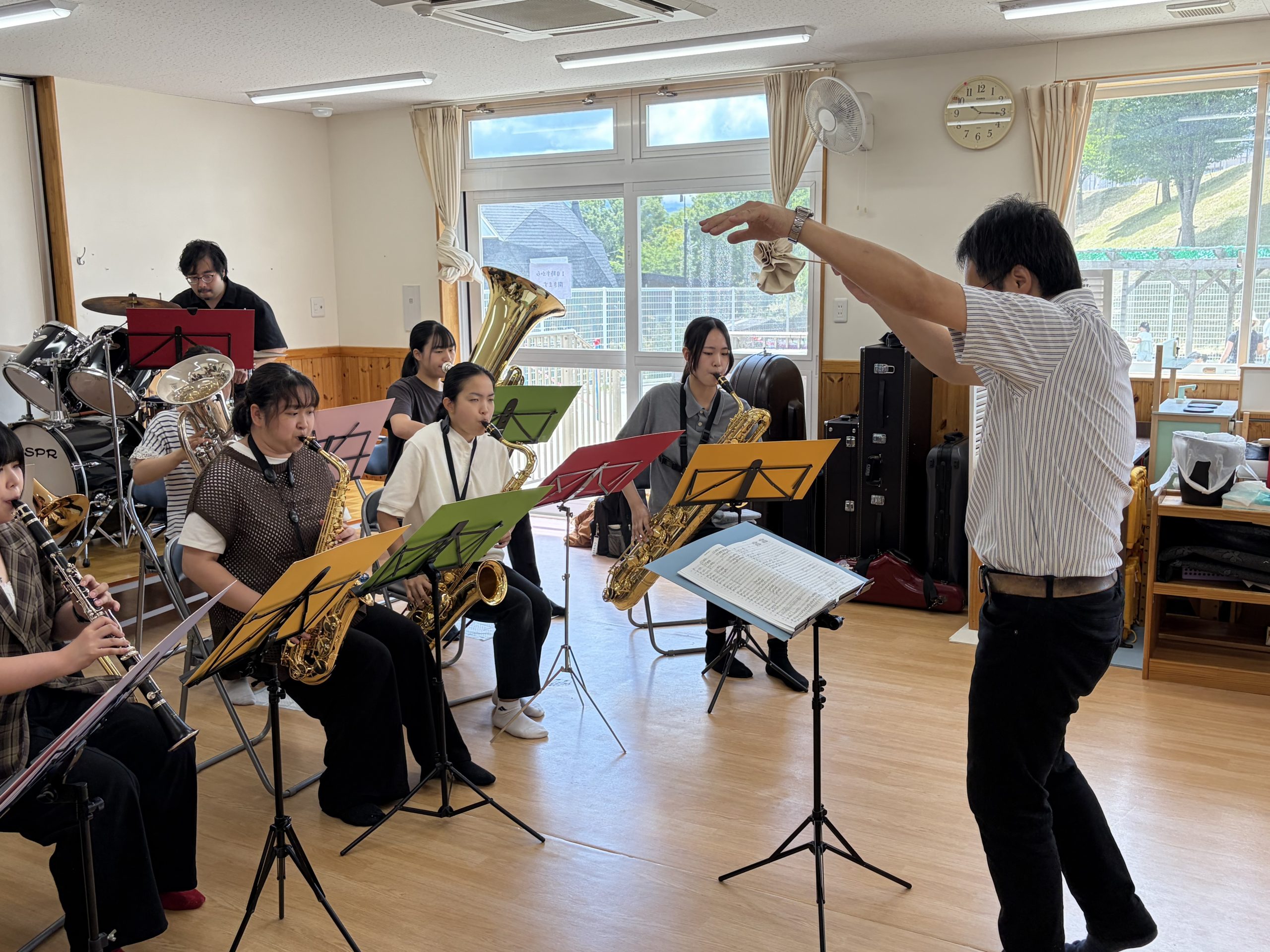 ウィンドアンサンブル部がこども園の夏まつりで訪問演奏を行いました